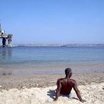 angola-oil-rigs-beach
