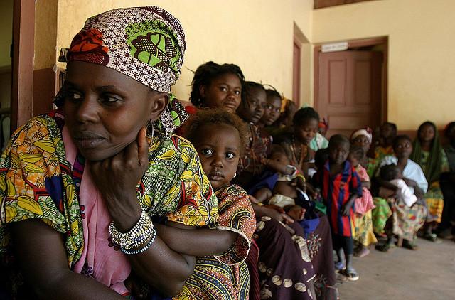 Waiting in line at a health centre in Bolemba, Central African Republic. Photograph by Pierre Holtz/UNICEF.