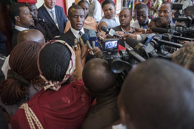 Journalists crowd around Cameroon's Minister for Forestry and Wildlife. Photograph by Ollivier Girard/CIFOR.