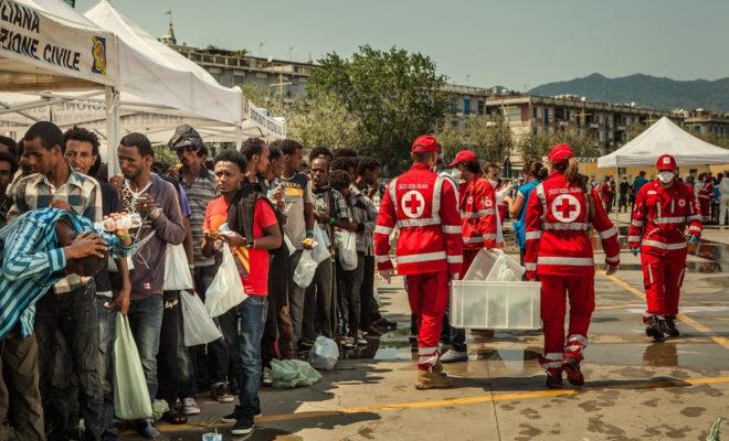 Red Cross welcomes migrants in Sicily, Italy.