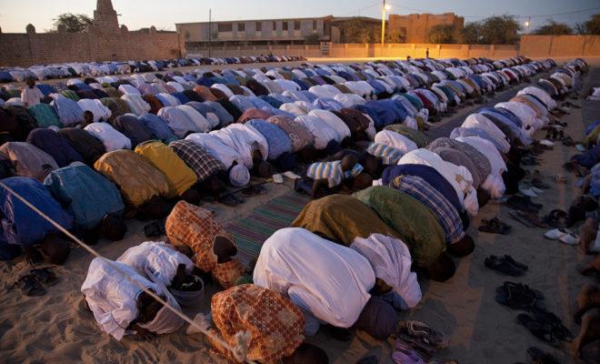 Malians in the north pray outside in Timbuktu. Credit: United Nations Photo.