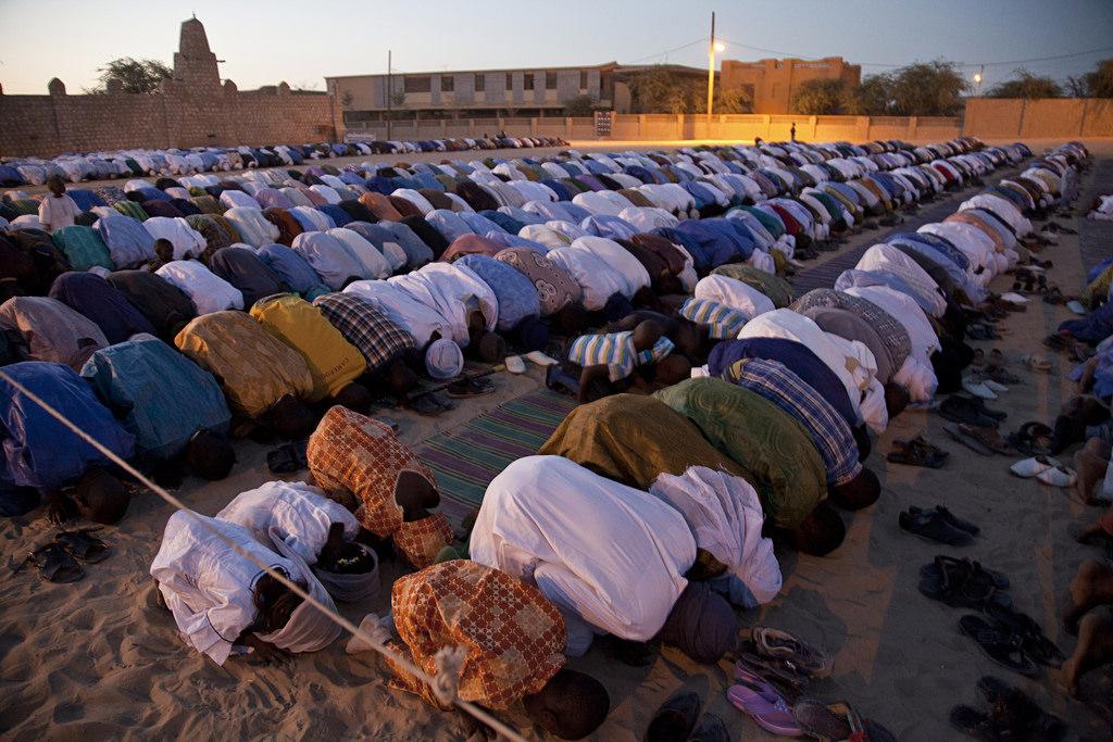 Malians in the north pray outside in Timbuktu. Credit: United Nations Photo.