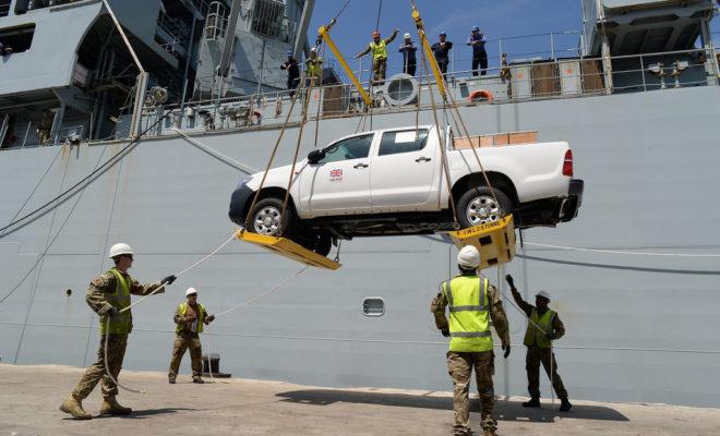 A UK Department for International Development (DfID) truck is unloaded in Freetown, Sierra Leone. Credit: Staff Sergeant Tom Robinson RLC.