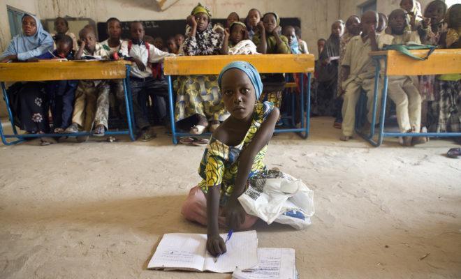 Sala, 6, and her schoolmates study in Niger after being resettled from Nigeria. Credit: UNHCR / H. Caux.