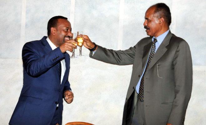 Ethiopia's PM Abiy Ahmed and Eritrea's President Isaias Afewerki at an official dinner in Asmara. Credit: Yemane Gebremeskel, Minister of Information, Eritrea.