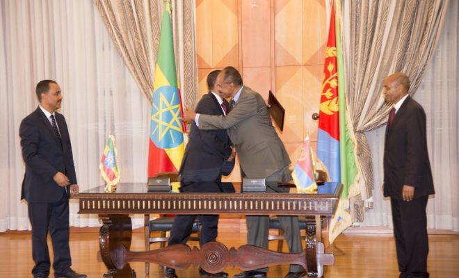 Abiy and Isaias embrace after signing the Joint Declaration of Peace and Friendship.