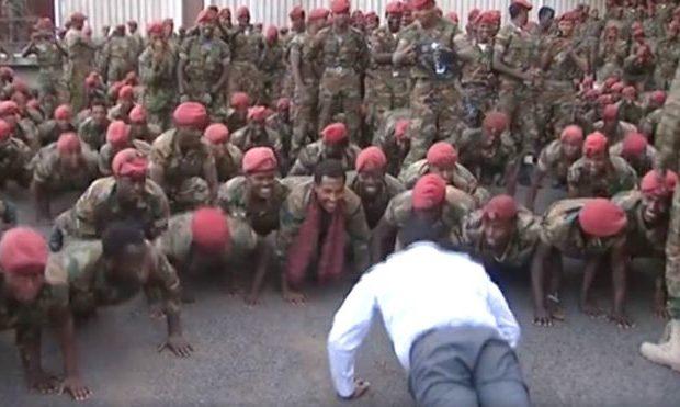 Ethiopia PM Abiy Ahmed doing press ups with protesting troops.