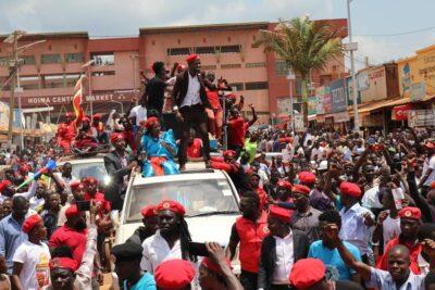 Bobi Wine and supporters at a rally this September don the red beret . Credit: Bobi Wine.