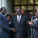 Mwai Kibaki shakes hands with opposition leader Raila Odinga during peace talks mediated by Kofi Annan in Kenya, January 2008. Credit: Boniface Mwangi/IRIN.