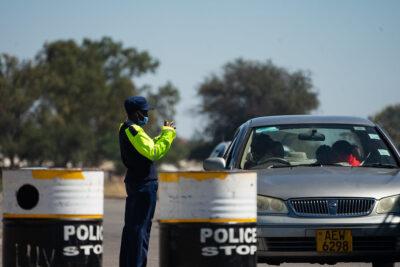 Zimbabwe doctor A police officer at a checkpoint in Bulawayo, Zimbabwe. Credit: KB Mpofu / ILO.