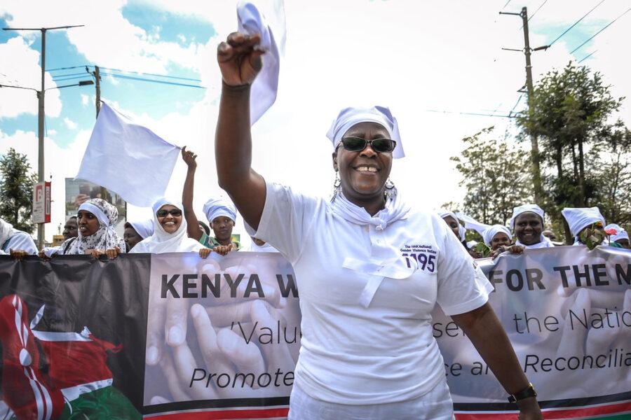 Ahead of Kenya's 2017 elections, the White Ribbon Campaign march to promote their rapid response hotline which responds to violence against women in elections. Credit: Carla Chianese, IFES.