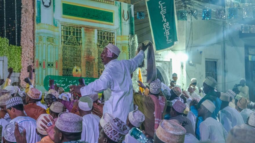 Men congregate on the public square in Lamu’s Old Town during the grand recitation of Mawlid. 
