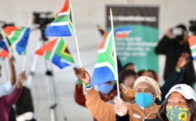 South Africa local elections 2021. Celebrants waving South African flags on 2021 National Freedom Day. Credit: GCIS.
