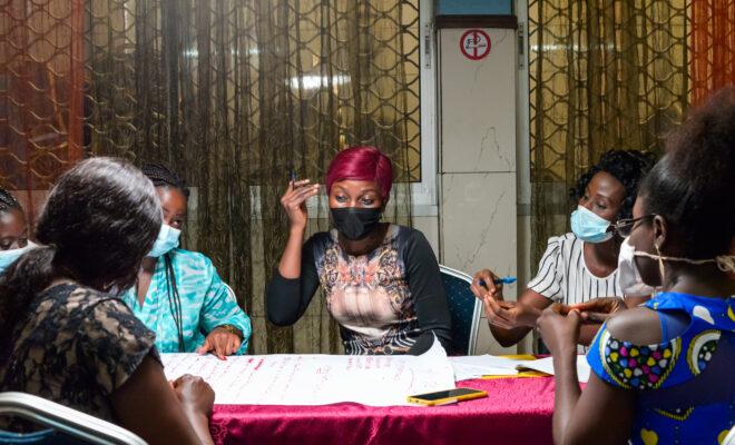 Group work at a workshop in Cameroon to support people with disabilities address gender based violence. Credit: Sightsavers.