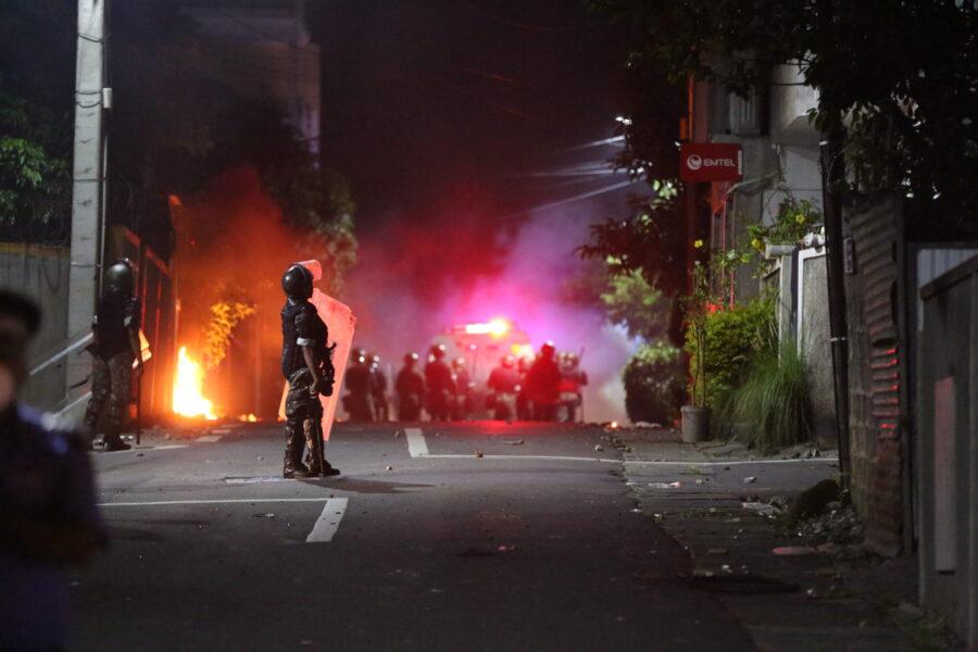 Riot police disperse protesters in Port Louis in April 2022. Credit: Vel Moonien.