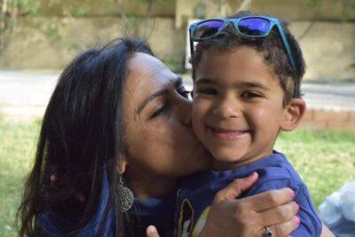 Rasha Mekky with her adopted son Mostafa. Credit: Rasha Mekky.