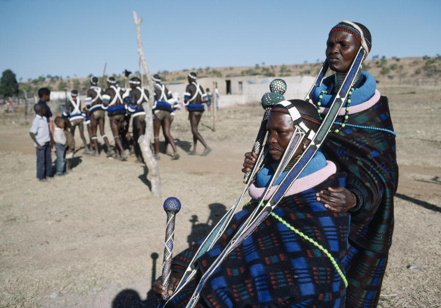 Two women from the Ndebele tribe wait for the start of an initiation ceremony. Credit: UN Photo/P. 