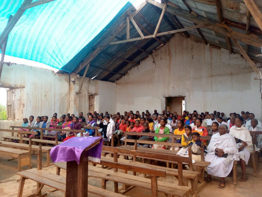 People gather in the church whose roof was ripped off by Cyclone Freddy in Androy, Madagascar. Credit: Lalatiana Rakotondranaivo.