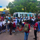 Students wait for daladala after school at Kawe bus stand in Dar es Salaam, Tanzania. Credit: Mweha Msemo.