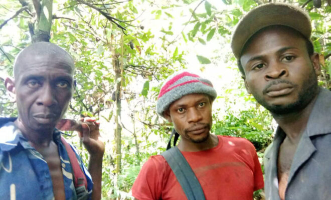 Andreas (right) with his colleagues in conservation in the Tofola Hill Wildlife Sanctuary, Cameroon.