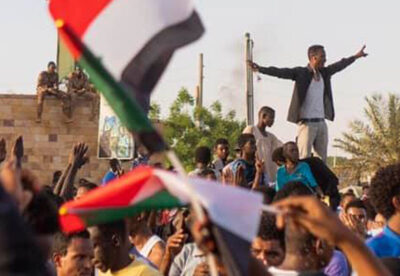 Protestors in Khartoum celebrating the fall of Omar al-Bashir, July 2019. Courtesy: Prachatai