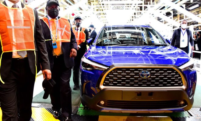 President Cyril Ramaphosa of South Africa officiates the launch of a hybrid electric vehicle (EV) in 2021. Credit: GCIS.